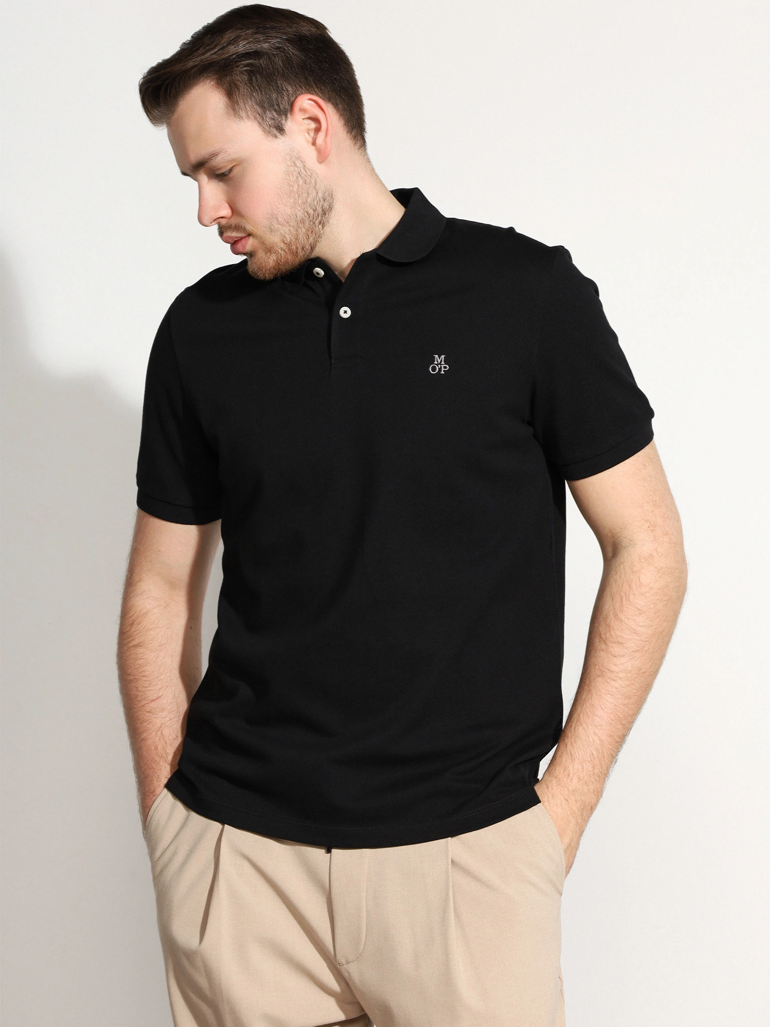 Поло черного цвета из хлопка